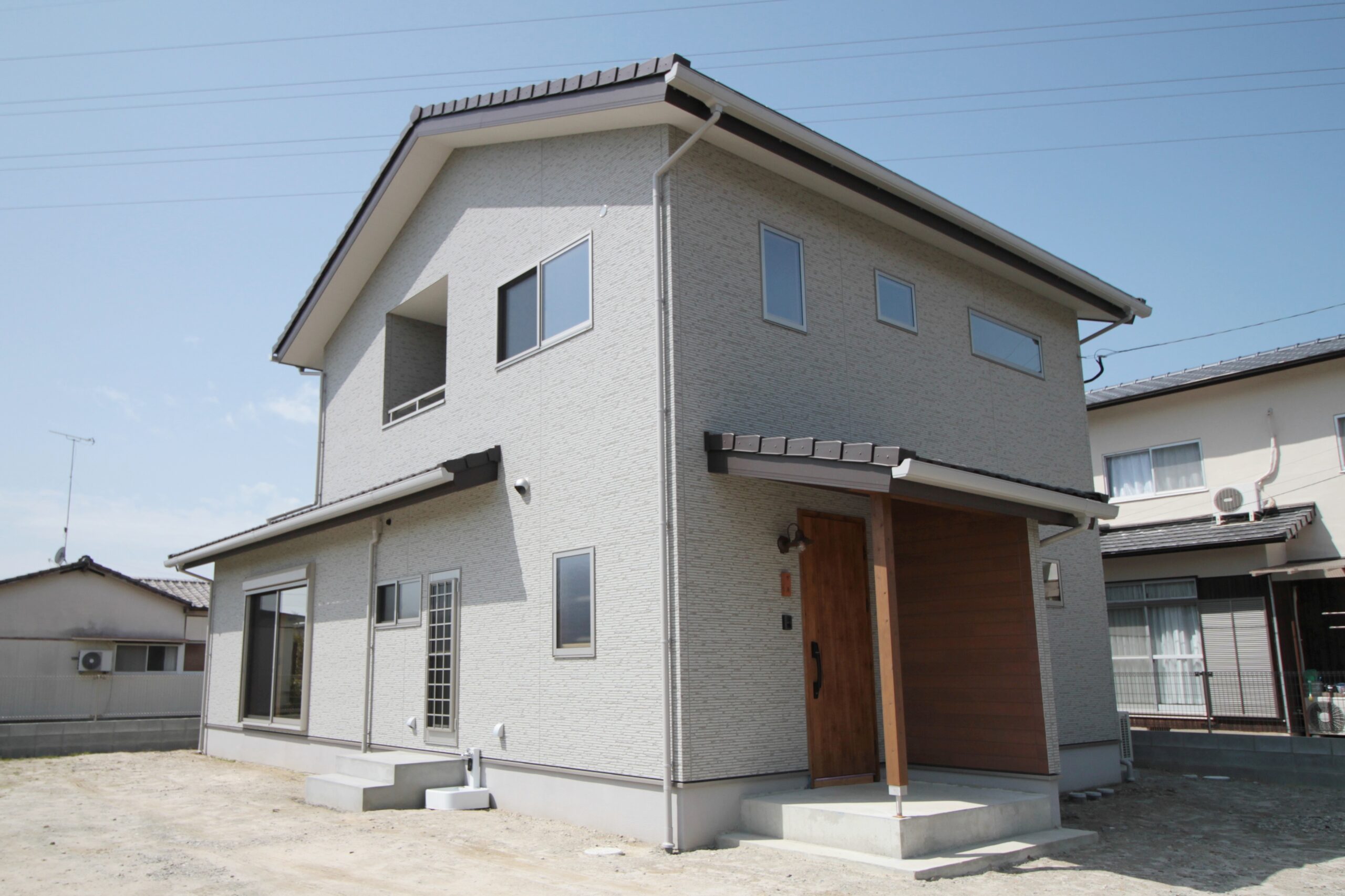 自然素材に囲まれた優しい風合いの家